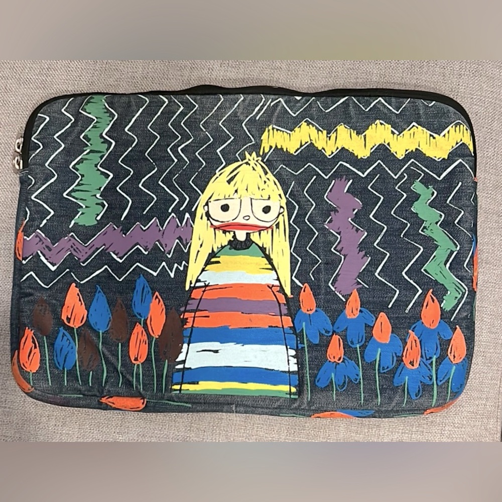 Marc Jacobs padded laptop sleeve.